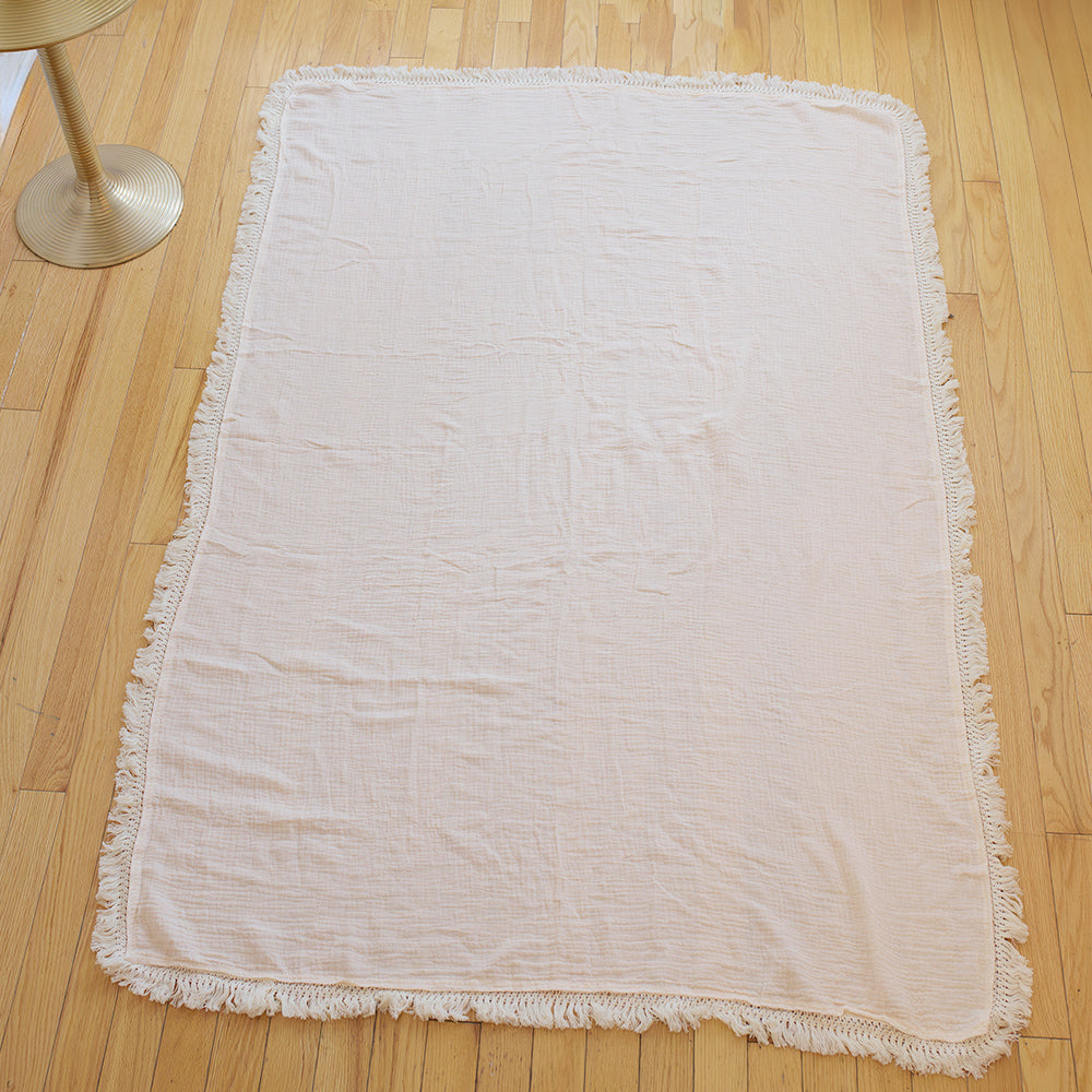 Couverture en mousseline à frange